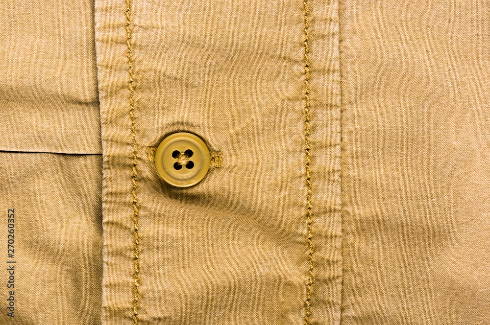 clothing items stonewashed cotton fabric texture with seams, clasps, buttons and rivets, macro clothing items stonewashed cotton fabric texture with seams, clasps, buttons and rivets, macro