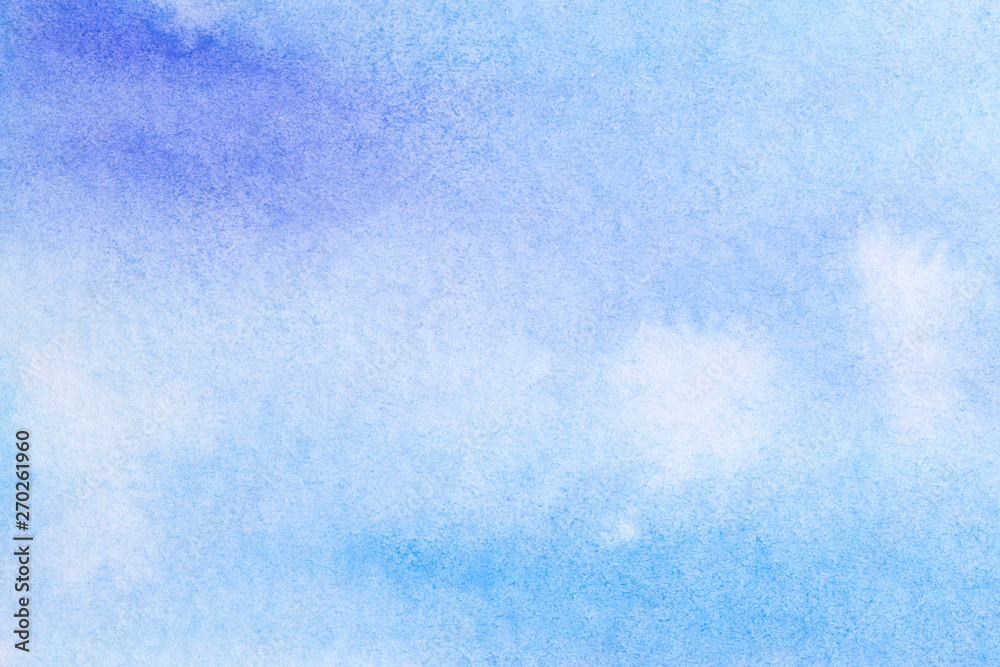 watercolor background filled blue with drips of paint spread over the paper. on textured watercolor paper paint