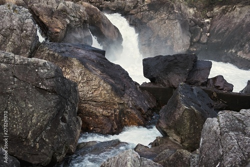 River and waterfall with stones in Norway