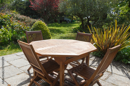 Terrace and wooden garden furniture during spring