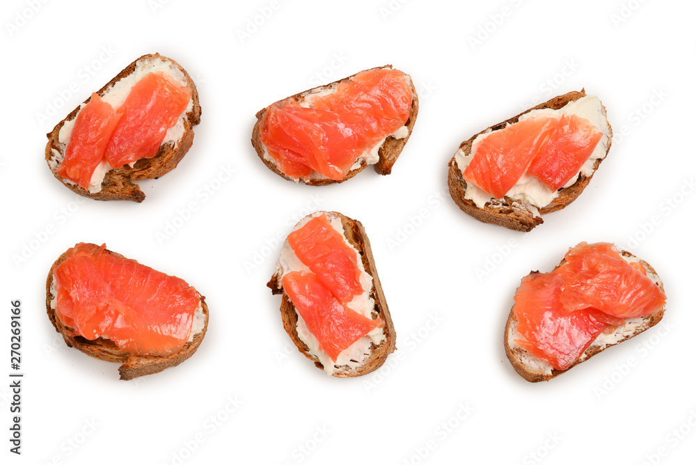 Salmon on a bread with cream isolated on white. Salmon on a bread with cream isolated on white.