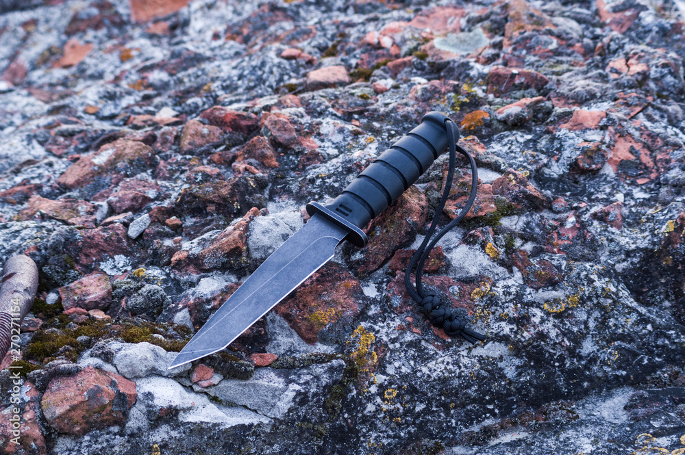 Obraz premium Knife with a tanto blade. Impact knife. Knife to attack.