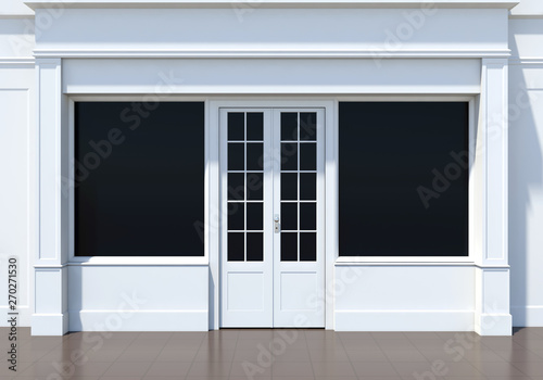 Classic shopfront with large windows. Small business white store facade photo