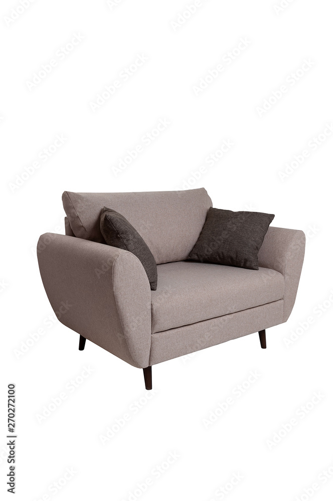 Modern small grey fabric sofa with pillows isolated on white background. Strict style furniture