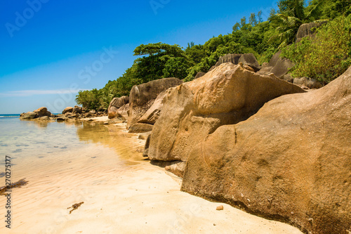 The giant granite boulders on the beach
