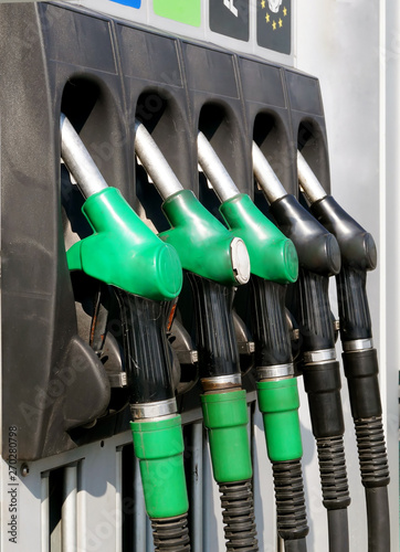 Obraz na płótnie Close-up gasoline pistols on column for refueling. w salonie