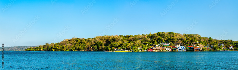 View of San Miguel Village across Lake Peten Itza, Guatemala