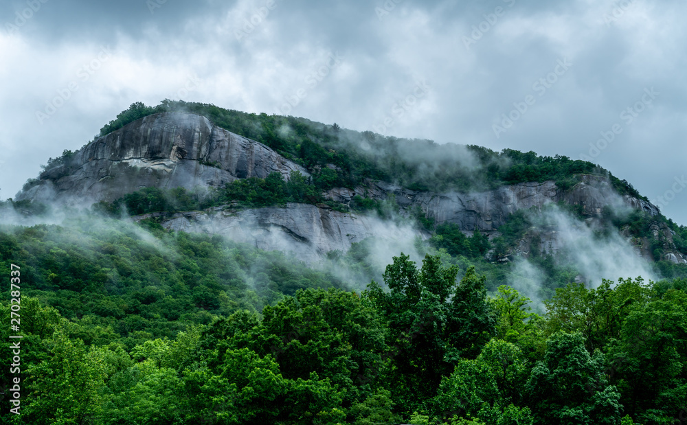 A rainy day in Chimney Rock makes the clouds hang low.