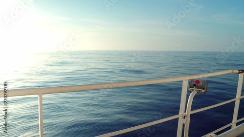 View from ship forecastle mooring deck to open sea. vessel is sailing photo