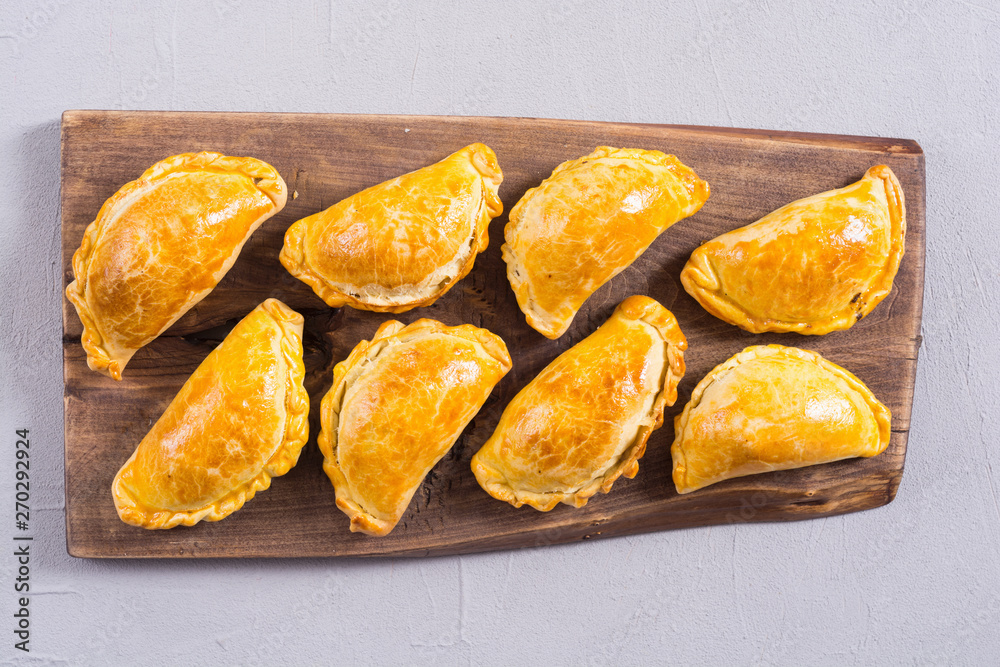 Latin American baked beef empanadas with sauce Latin American baked beef empanadas with sauce