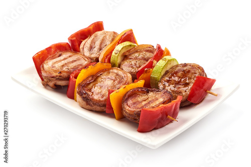 Grilled Meat medallions wrapped in bacon, close-up, isolated on white background