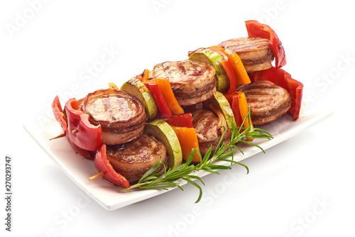 BBQ grilled Pork medallions wrapped in bacon, close-up, isolated on white background photo