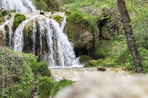 Fototapeta Naklejka Na Ścianę i Meble -  beautiful waterfall in the wooded forest