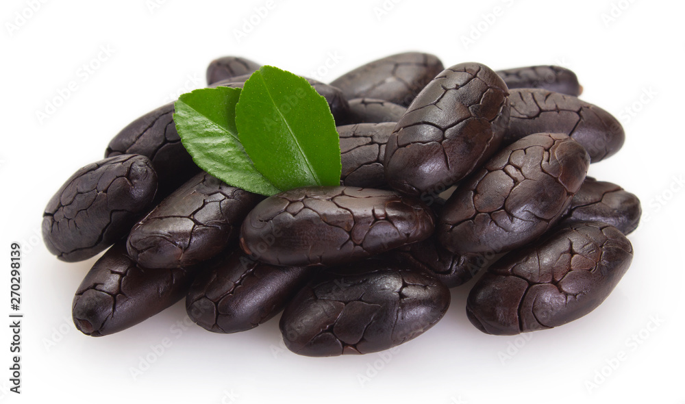 Cocoa bean on white background Cocoa bean on white background