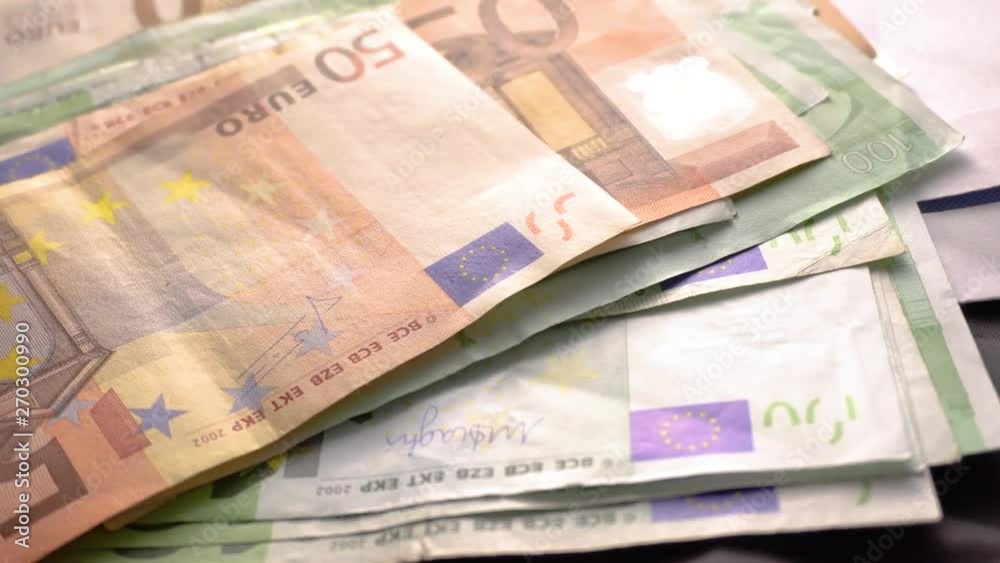 Euro Money Banknotes. Envelope banknotes as part of the united country's payment system. Euro Money currency. Envelope Cash money on the table. Forex or global financial Business and Finance Concept Euro Money Banknotes. Envelope banknotes as part of the united country's payment system. Euro Money currency. Envelope Cash money on the table. Forex or global financial Business and Finance Concept