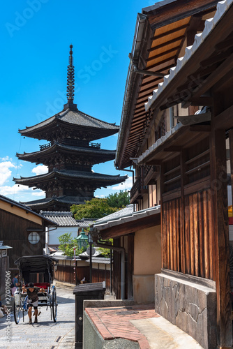 View of Yasaka-dori area with Hokanji temple (Yasaka Pagoda), near Sannen-zaka and Ninen-zaka Slopes. Here is the most photogenic landmark in Kyoto, Japan