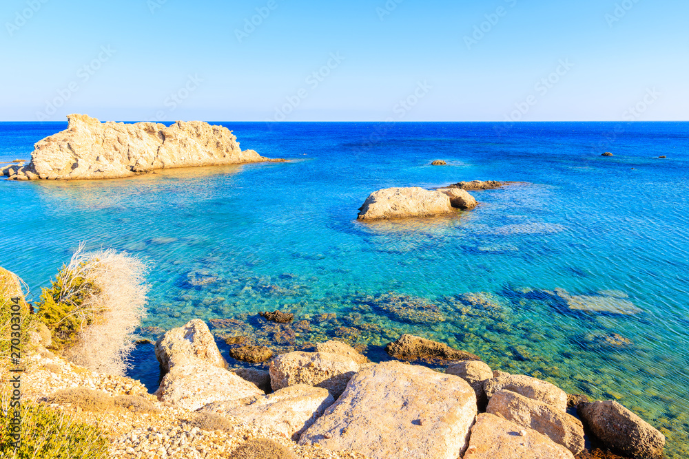View of beautiful sea coast with rocks at Ammopi beach, Karpathos island, Greece