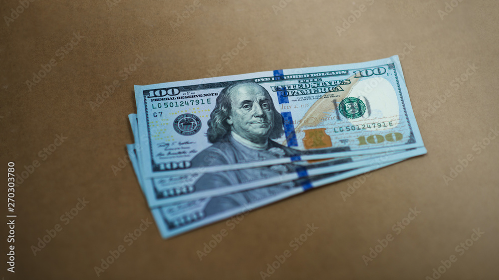 Close-up banknotes Cash Money 100 American Dollars See details of US dollar on paper. Close-up banknotes Cash Money 100 American Dollars See details of US dollar on paper.
