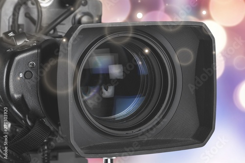 Professional video camera on dark background