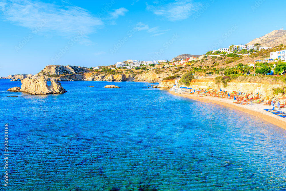 Azure sea and beautiful beach on Karpathos island in Ammopi village, Greece
