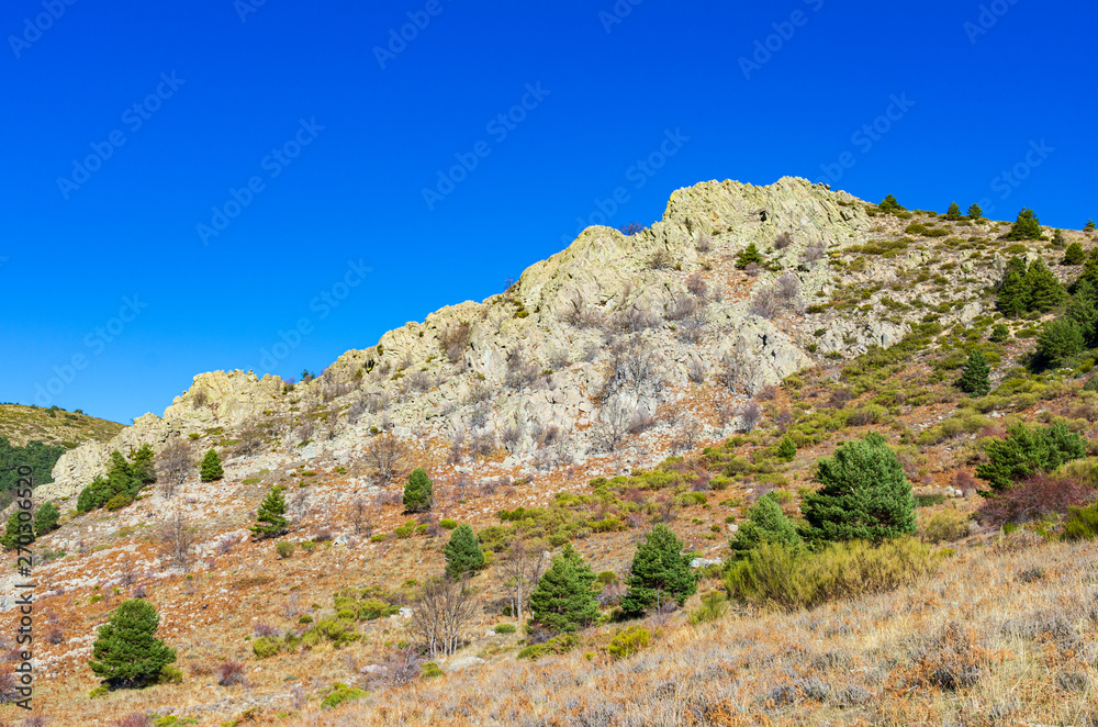Landscape of a rocky mountain and deep blue sky Landscape of a rocky mountain and deep blue sky