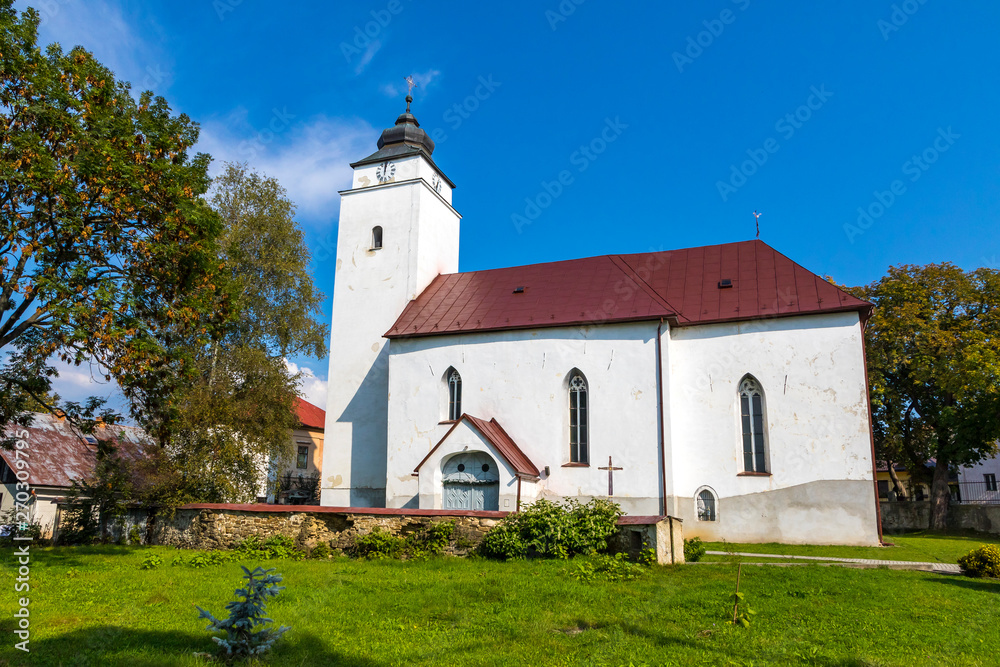 Church of St.Andrew (Slovak: Kostel sv.Ondreje Apostola) in Velky Slavkov, Slovakia. Located in the middle of the village against the municipal office. Built in 13-14 centuries in Early-Gothic style