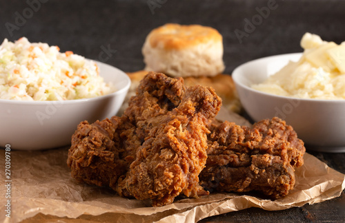 Obraz na plátně Meal of Fried Chicken Mashed Potatoes Coleslaw and Buttermilk Biscuits