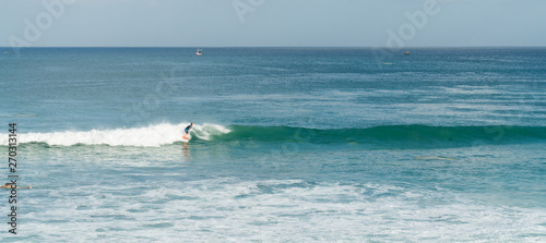 Bali ocean waves on surf spot Dreamland. Indonesia blue ocean resort