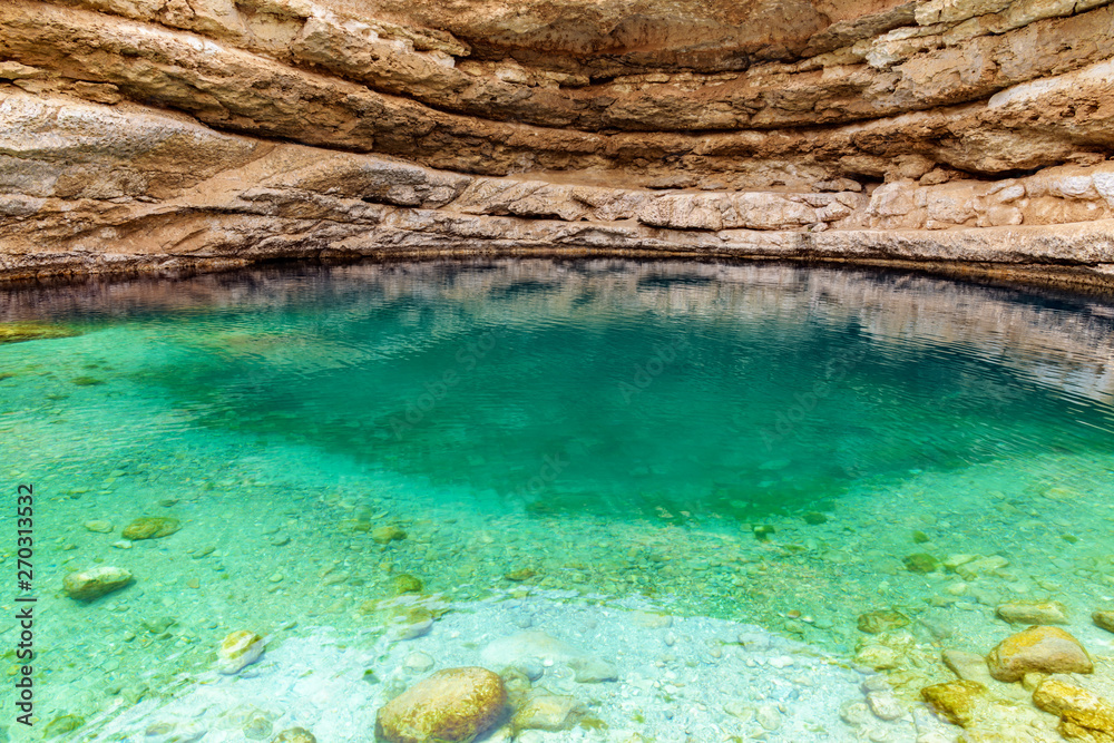 Bimmah Sinkhole in eastern Muscat Governorate, Oman. It is 50 m by 70 m wide and approximately 20 m deep. Bimmah Sinkhole in eastern Muscat Governorate, Oman. It is 50 m by 70 m wide and approximately 20 m deep.