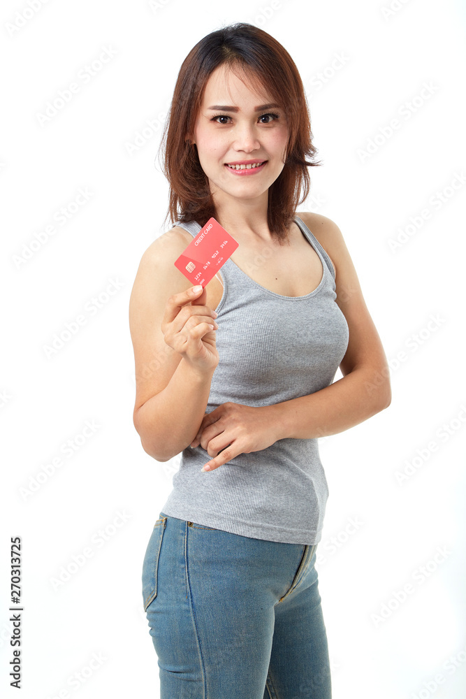 Young smiling asian woman presenting credit card Young smiling asian woman presenting credit card