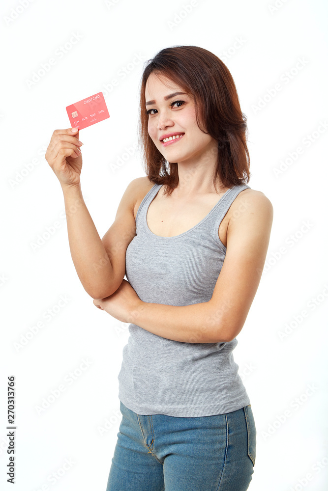 Young smiling asian woman presenting credit card Young smiling asian woman presenting credit card