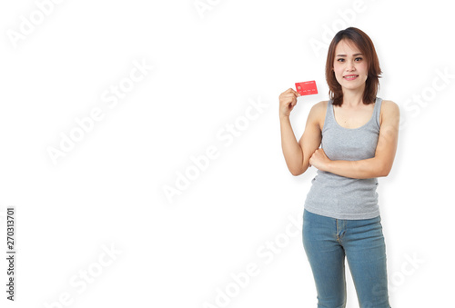 Young smiling  asian woman presenting credit card