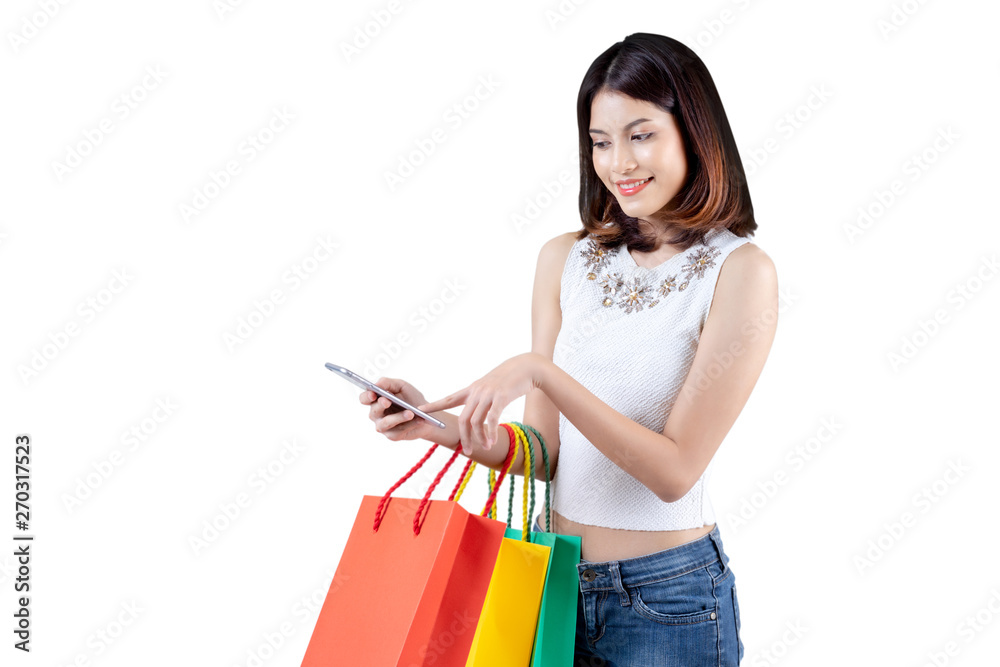 Happy woman in summer enjoying shopping holding smartphone and colorful shopping bag on white background, shopping concept, isolate concept. Happy woman in summer enjoying shopping holding smartphone and colorful shopping bag on white background, shopping concept, isolate concept.
