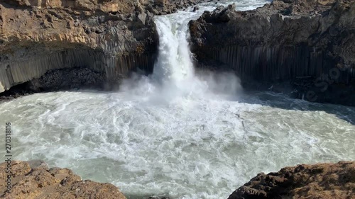 Majestic waterfall Aldeyjarfoss surrounded by basalt rocks in the highlands of Iceland, only available to get to from an F-road photo