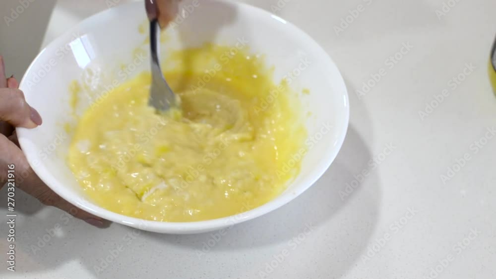 Making waffles for breakfast using waffle mix, milk, eggs and butter. Kids love it. Making waffles for breakfast using waffle mix, milk, eggs and butter. Kids love it.