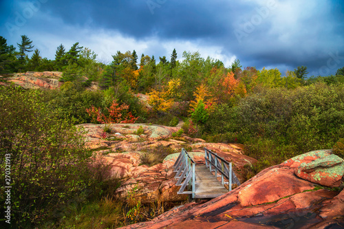 A bridge between rocks in Ontario's rugged north photo