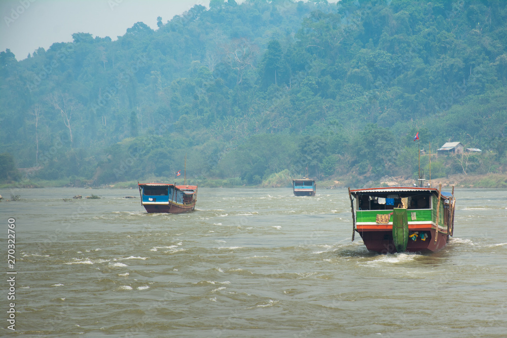 View to Laos boats transportation by Mekong River, Chiang Khong,Thailand View to Laos boats transportation by Mekong River, Chiang Khong,Thailand