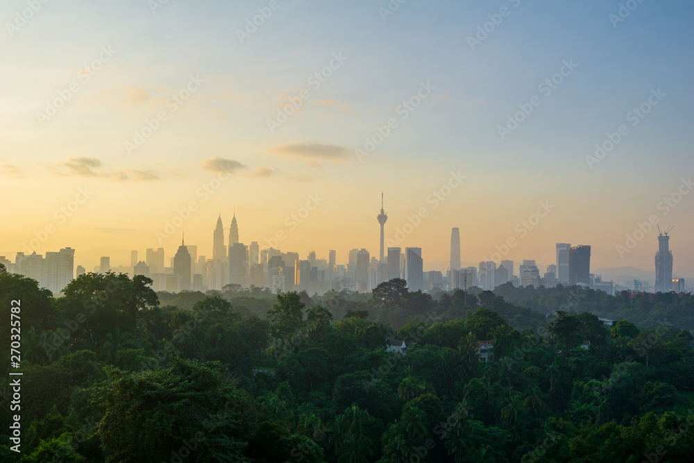 Majestic sunrise over downtown Kuala Lumpur (KL). KL is the capital of Malaysia. 