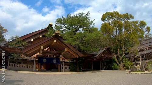 Timelapse. Kagura-den Hall at Atsuta-Jingu Shrine in Nagoya, Aichi, Japan. Zoom Out photo