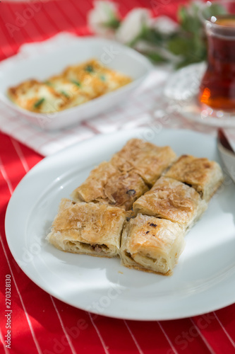 Turkish traditional food "borek" fast breakfast  and turkish tea