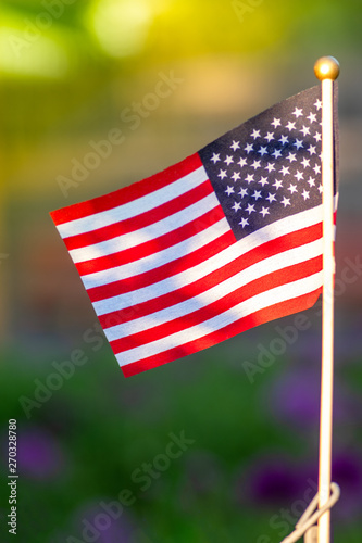 Flag of the United States. Green grass background. Celebration concept, Memorial Day, 4th of July , USA Independence Day. photo