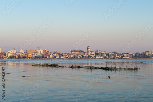 view of chiggia and sottomarina in venice at sunset photo