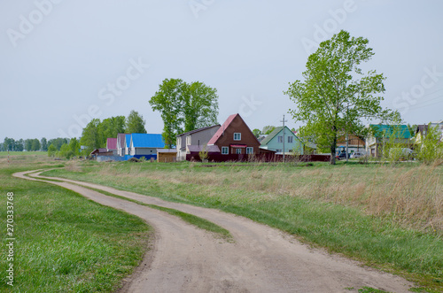 landscape the village in the spring to Siberia Russia