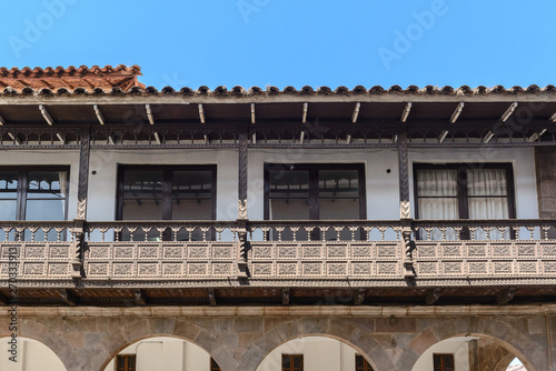 Wooden balcony of a colonial house, Main Square of Cusco, Peru