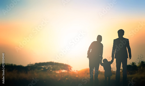 Global Day of Parents concept:   Family at sunrise background