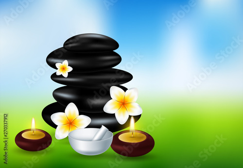 Spa concept zen stones and frangipani flowers