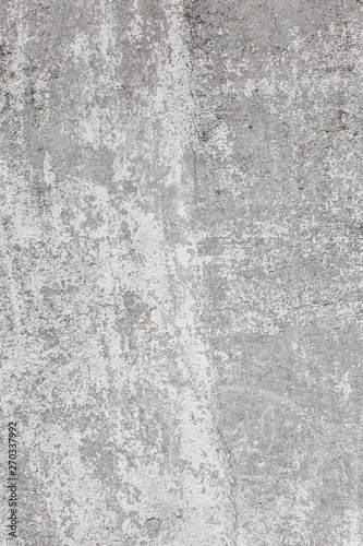 The texture of old concrete wall for background with a concrete splash on the wall © Sergey