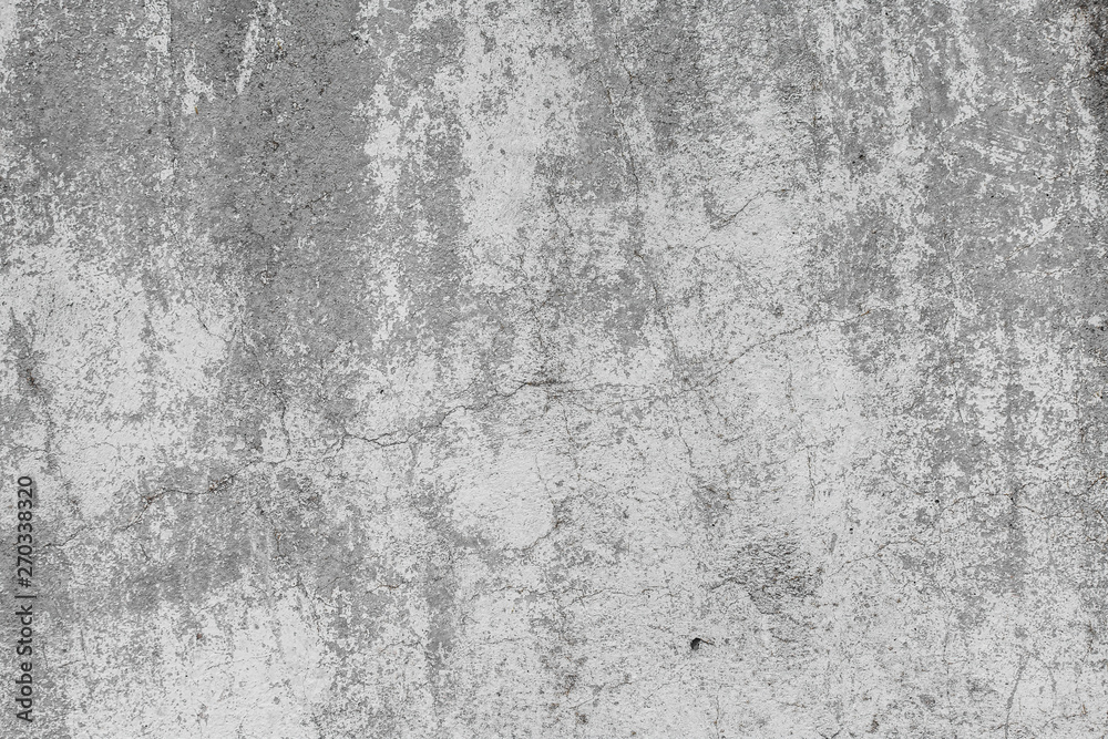 The texture of the old grey concrete wall with scratches, cracks, dust, crevices, roughness, stucco. Can be used as a poster or background for design