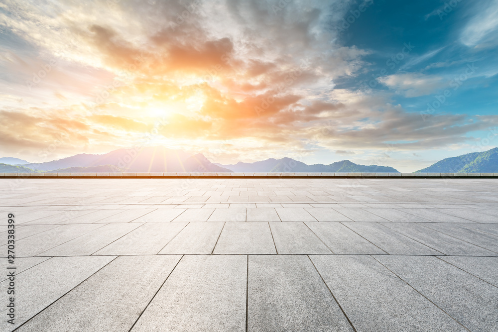 Empty square floor and beautiful mountains nature landscape at sunset Empty square floor and beautiful mountains nature landscape at sunset