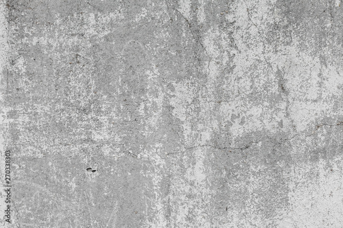 The texture of the old grey concrete wall with scratches, cracks, dust, crevi...